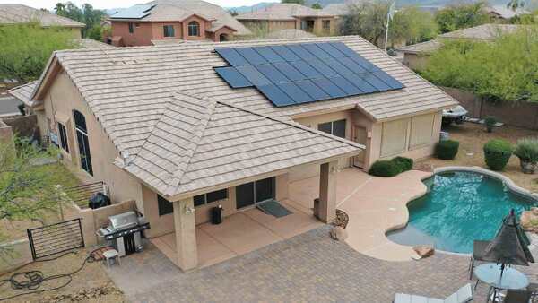solar-panels-on-roof-with-pool-outside-2