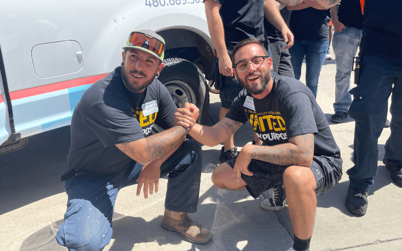 sun valley solar and pe solar team member shaking hands
