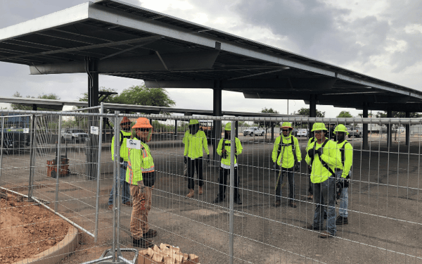 Sun valley solar crew standing in front of solar carport