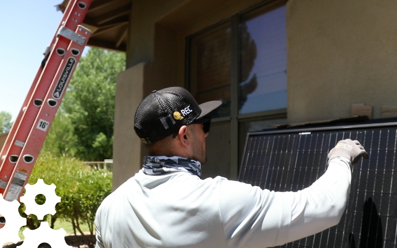 sun valley solar installer grabbing a solar panel